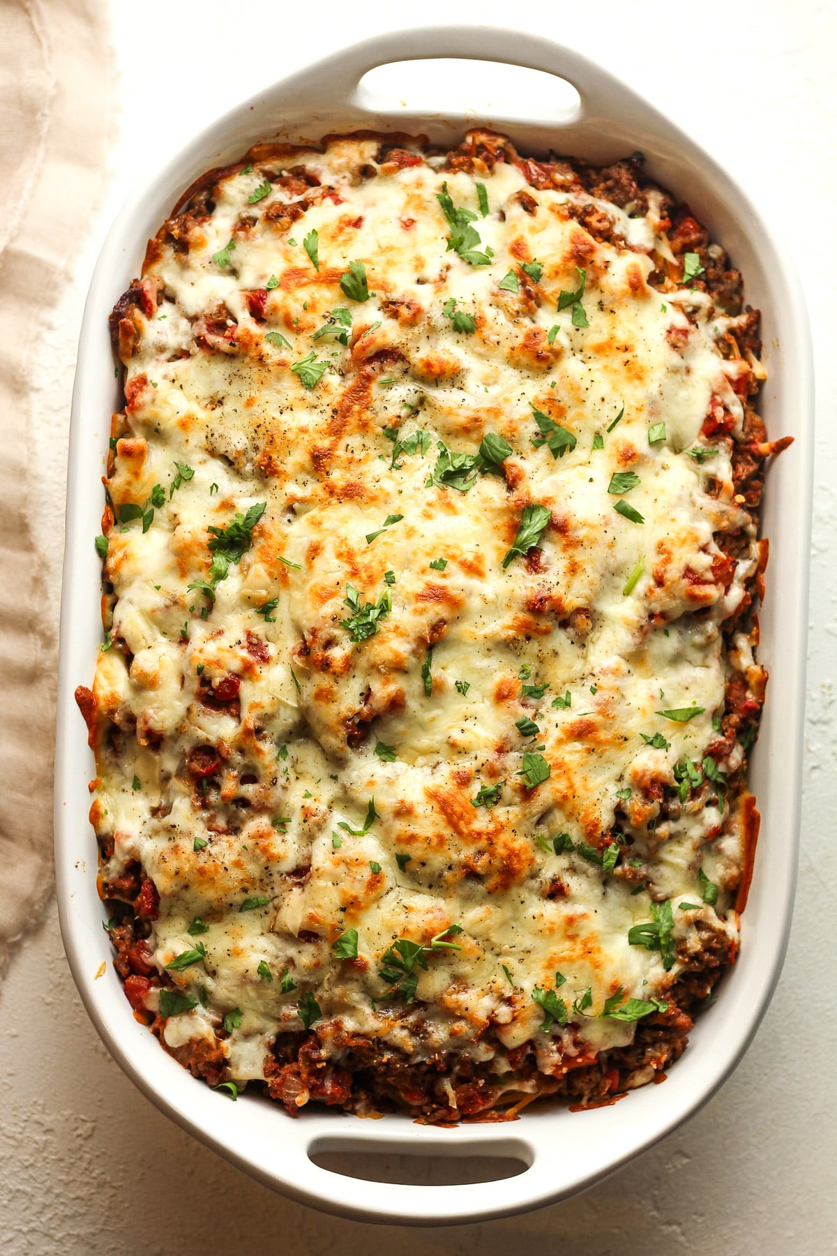 Overhead view of a just baked spaghetti casserole.