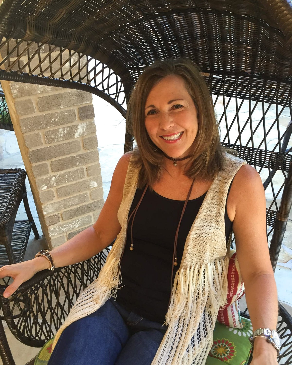 The original photo of SueBee for the blog - me sitting on a porch swing.