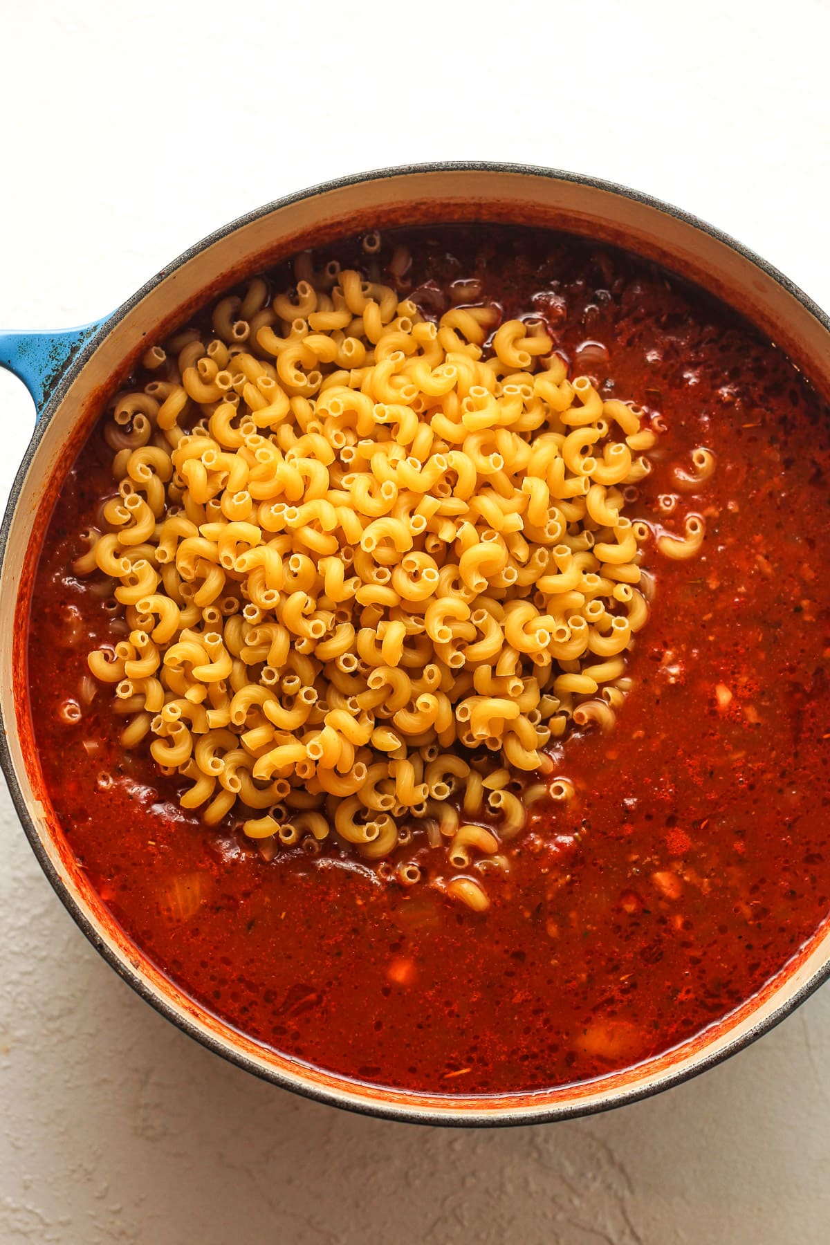 A large pot of the goulash after adding the pasta.